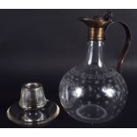 AN EDWARDIAN GLASS DECANTER together with a silver mounted match striker. 21 cm & 8 cm high. (2)
