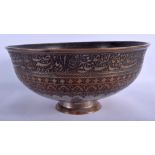 A LARGE 17TH CENTURY SAFAVID TINNED COPPER BOWL Persia, decorated with extensive scripture and foli