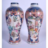 A PAIR OF 18TH CENTURY CHINESE MANDARIN PORCELAIN VASES Qianlong. 25 cm high.