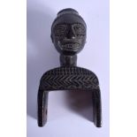 AN AFRICAN TRIBAL PULLEY. 17 cm x 8 cm.