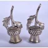 A PAIR OF VICTORIAN SILVER THISTLE DESK SANDERS. 9 cm long.