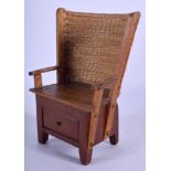 AN EARLY 20TH CENTURY SCOTTISH APPRENTICE MINIATURE ORKNEY CHAIR. 18 cm x 8 cm.