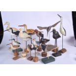 A COLLECTION OF WOODEN BIRD SCULPTURE, varying species. Largest 46 cm. (qty)