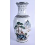 A CHINESE REPUBLICAN FAMILLE ROSE VASE painted with landscapes. 21 cm high.