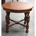 AN OAK OCCASIONAL TABLE, formed with turned legs. 48 cm x 61 cm.