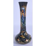 A MOORCROFT PHOENIX RISING VASE. 22 cm high.