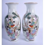 A PAIR OF CHINESE REPUBLICAN PERIOD FAMILLE ROSE VASES painted with females with landscapes. 29 cm