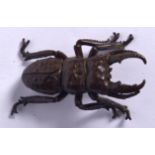 A JAPANESE BRONZE OKIMONO IN THE FORM OF A STAG BEETLE, signed to base. 6.5 cm long.