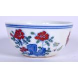 A 20TH CENTURY CHINESE DOUCAI PORCELAIN BOWL, decorated with flowering rock. 8 cm wide.