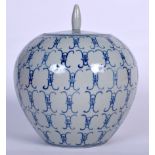 A CHINESE BLUE AND WHITE PORCELAIN JAR AND COVER, decorated with symbols. 21 cm x 16 cm.