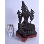 A 19TH CENTURY INDIAN NEPALESE BRONZE FIGURE OF A SEATED BUDDHA modelled with one hand raised. Bron