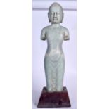 A LARGE HARDSTONE CARVED FIGURE OF BUDDHA, formed upon a sloping plinth. 60 cm high.