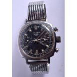 A VINTAGE CAMARO HEUER BLACK DIAL WRISTWATCH with two sub dials and outer tachymeter. 3.5 cm wide.