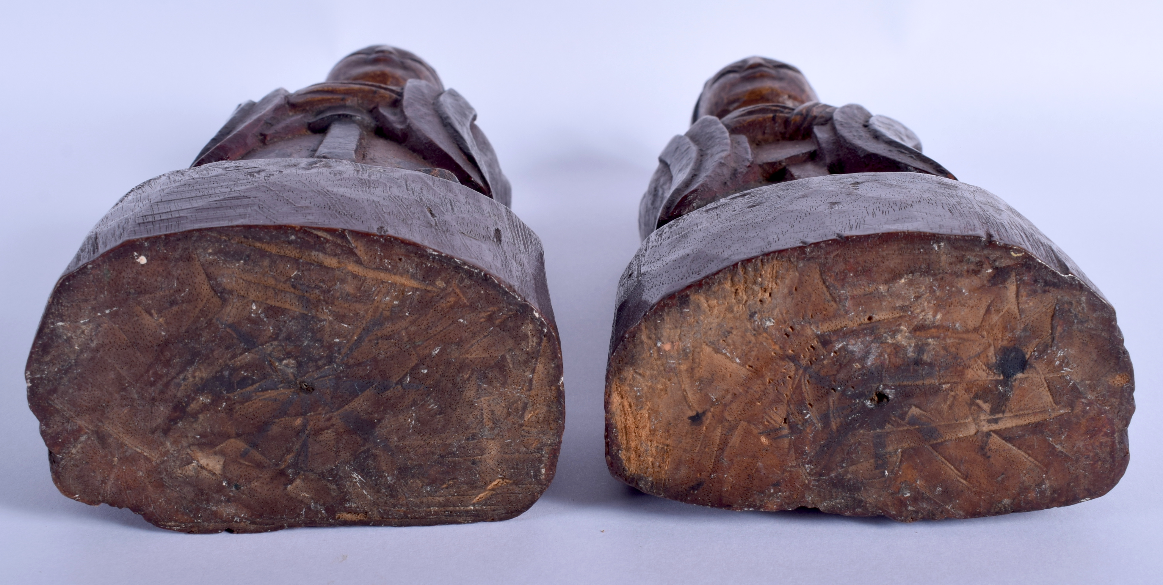 A PAIR OF 19TH CENTURY KOREAN JOSEON DYNASTY CARVED WOOD BUDDHAS modelled upon wooden plinths. 23 c - Image 3 of 3