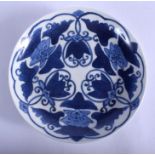 AN 18TH CENTURY JAPANESE EDO PERIOD BLUE AND WHITE DISH painted with flowers. 15 cm wide.