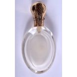 AN ANTIQUE 18CT GOLD FRENCH CRYSTAL SCENT BOTTLE. 8.5 cm high.