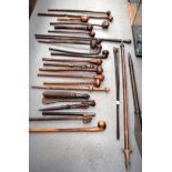 A COLLECTION OF ANTIQUE TRIBAL CLUBS, including Fijian and Tongan clubs, varying form. (26)
