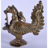 AN 18TH/19TH CENTURY INDIAN BRONZE BUDDHISTIC BIRD modelled with a sprig within its mouth. 14 cm x