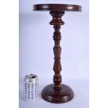 A LARGE 19TH CENTURY TREEN LIGNUM VITAE CARVED STAND. 42 cm x 18 cm.