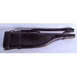 A LARGE VICTORIAN LEATHER MUTTON OF LAMB GUN CASE. 75 cm x 15 cm.