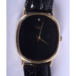 A GOLD PLATED LONGINES BLACK DIAL WRISTWATCH. 2.75 cm x 3 cm.