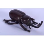 A JAPANESE BRONZE OKIMONO IN THE FORM OF A LONG HORN BEETLE, signed. 7 cm long.