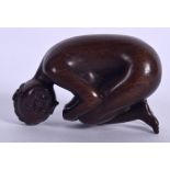 A JAPANESE NETSUKE IN THE FORM OF A NUDE FEMALE, signed to backside. 5.25 cm wide.