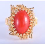 A 1970S 18CT GOLD AND CORAL RING. 8.4 grams. O/P.