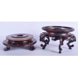 TWO 19TH CENTURY CHINESE HONGMU STANDS. 16 cm wide. (2)