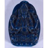 A CHINESE CARVED LAPIS LAZULI TYPE CARVED PENDANT, decpicting a seated buddha. 6.5 cm x 4.5 cm.