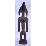 A LARGE MALIAN BAMBARA WOODEN STATUE, formed standing with copper piercings and studwork to head. 87