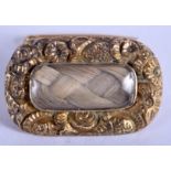 A GEORGE III YELLOW METAL MOURNING BROOCH PENDANT. 5.4 grams. 2.25 cm x 1.25 cm.