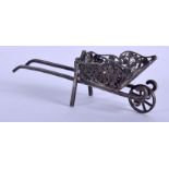 A SILVER WHEELBARROW. 6.5 cm wide.