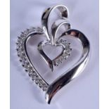 A 14CT GOLD HEART PENDANT. 3.9 grams. 2.5 cm x 2.5 cm.