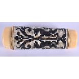 AN ANTIQUE CARVED IVORY AND BEAD WORK PARASOL HANDLE. 11 cm x 4 cm.