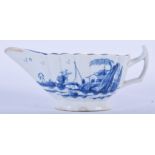 18TH C. WORCESTER SMALL FLUTED SAUCEBOAT PAINTED IN BLUE WITH CHINESE LANDSCAPES, WORKMAN'S MARKS.