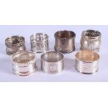 SEVEN ANTIQUE SILVER NAPKIN RINGS. 6.5 oz. (7)