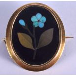 A VICTORIAN HIGH CARAT GOLD PIETRA DURA BROOCH. 2.75 cm x 2.75 cm.