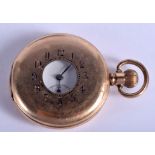 AN ANTIQUE HALF HUNTER GOLD PLATED POCKET WATCH. 4.75 cm wide.