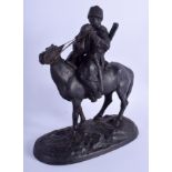 AN ANTIQUE RUSSIAN CAST IRON KOSSACK modelled upon a horse. 16 cm x 22 cm.