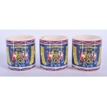 THREE UNUSUAL MILITARY STYLE DRUM SHAPED JAM POTS. 5.5 cm high. (3)