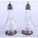 A PAIR OF VINTAGE SILVER CONDIMENTS. 13 cm high.