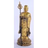 A CHINESE GILT BRONZE FIGURE OF A STANDING BUDDHA. 24 cm high.