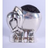 A VINTAGE ENGLISH SILVER ELEPHANT PIN CUSHION. 4 cm x 5 cm.