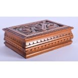 AN ANTIQUE CONTINENTAL CARVED WOOD STAMP BOX. 8 cm x 5.5 cm.