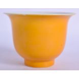 A CHINESE YELLOW GLAZED PORCELAIN BOWL. 9.75 cm wide.