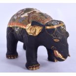A JAPANESE SATSUMA POTTERY FIGURE OF AN ELEPHANT, modelled standing. 23 cm wide. 23 cm wide.