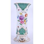 A CONTINENTAL PORCELAIN FLOWER VASE. 22 cm high.