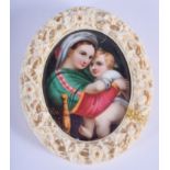 A 19TH CENTURY CHINESE CANTON IVORY FRAME containing a German antique porcelain plaque. 8 cm x 10 cm