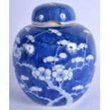 A 19TH CENTURY CHINESE BLUE AND WHITE PORCELAIN GINGER JAR BEARING KANGXI MARKS, painted with prunus